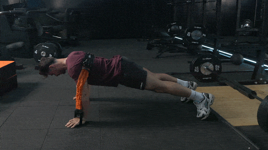 Sklekovi pomoću elastične trake