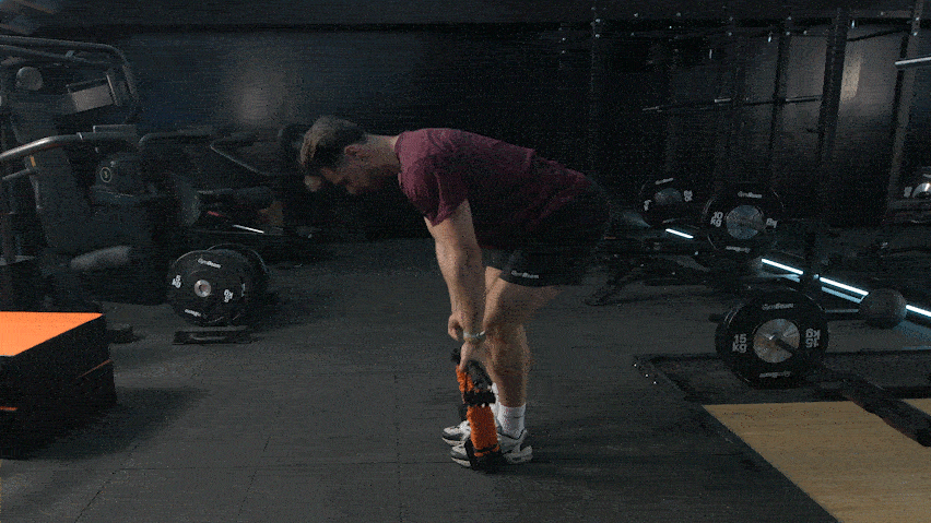 Veslanje u pretklonu pomoću elastične trake