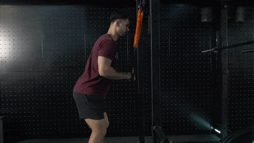 Donja povlačenja za tricepse pomoću elastične trake