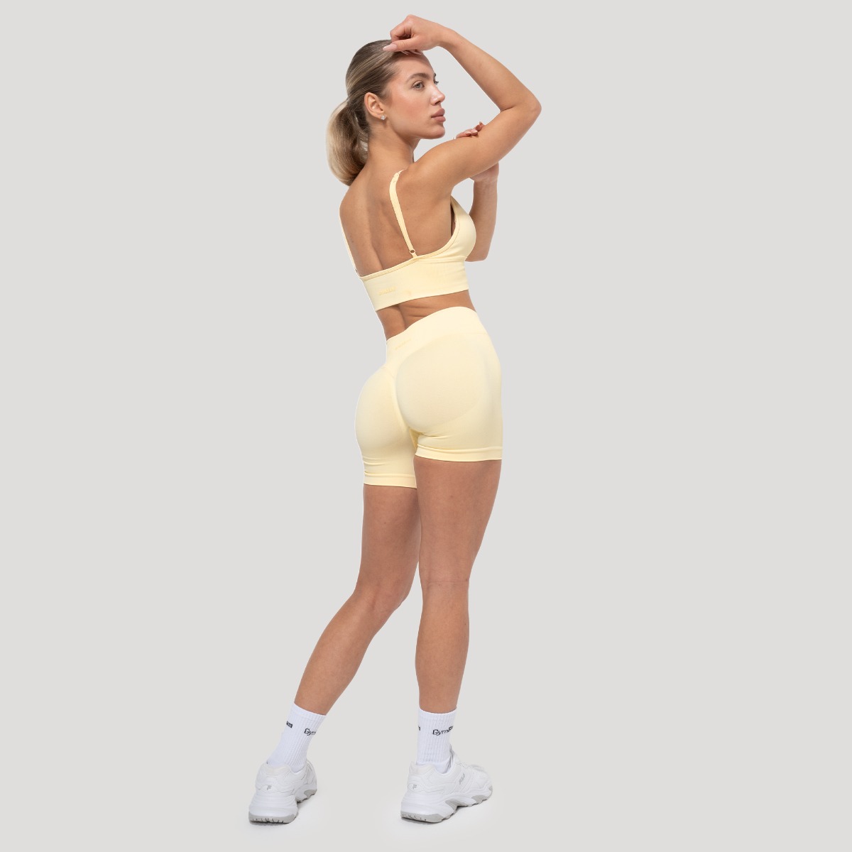 GymBeam Ženske kratke hlače Luma Butter Yellow - Veličina: XS | Boja: Žuta | Težina: 0,1 g | Pakiranje: 133 · záber 7