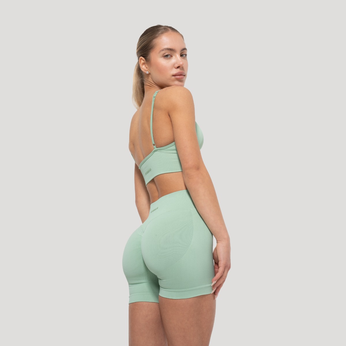 GymBeam Ženske kratke hlače Pistachio- GymBeam - Veličina: S | Boja: Zelená | Težina: 0,107 g | Pakiranje: 127 · záber 7